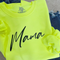 close up of womens pullover sweatshirt with screen print design that says mama the color is a highlighter green cozy and cute casual sweatshirt